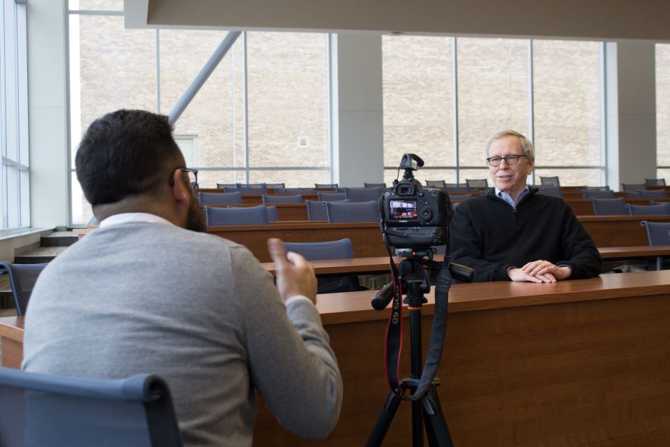 Roger Goldman speaks with a reporter