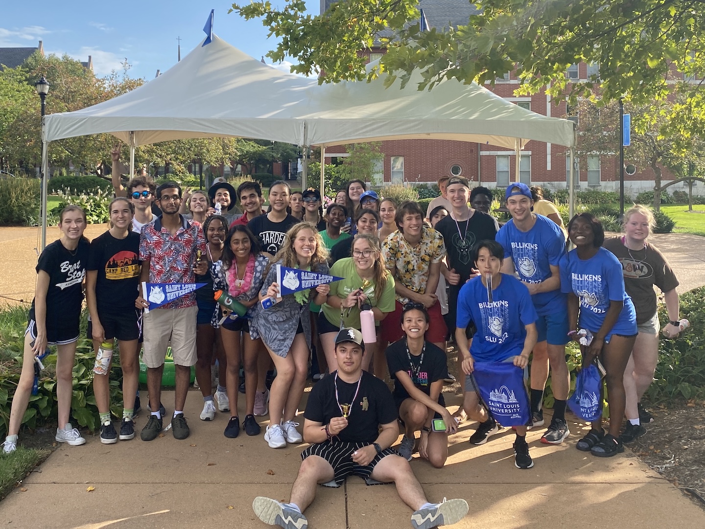 A group of Micah students pose for a photo together.