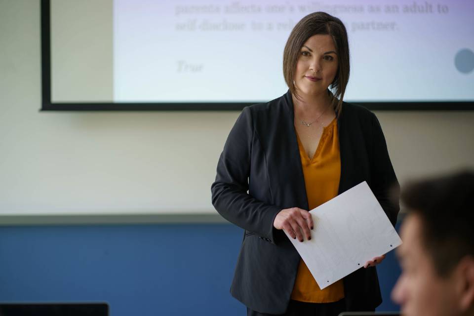 Jennifer Ohs teaches in a classroom in Grand Hall